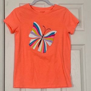 A fun, bubbly colored T-shirt that’s great in the summer. Lightly worn as well!